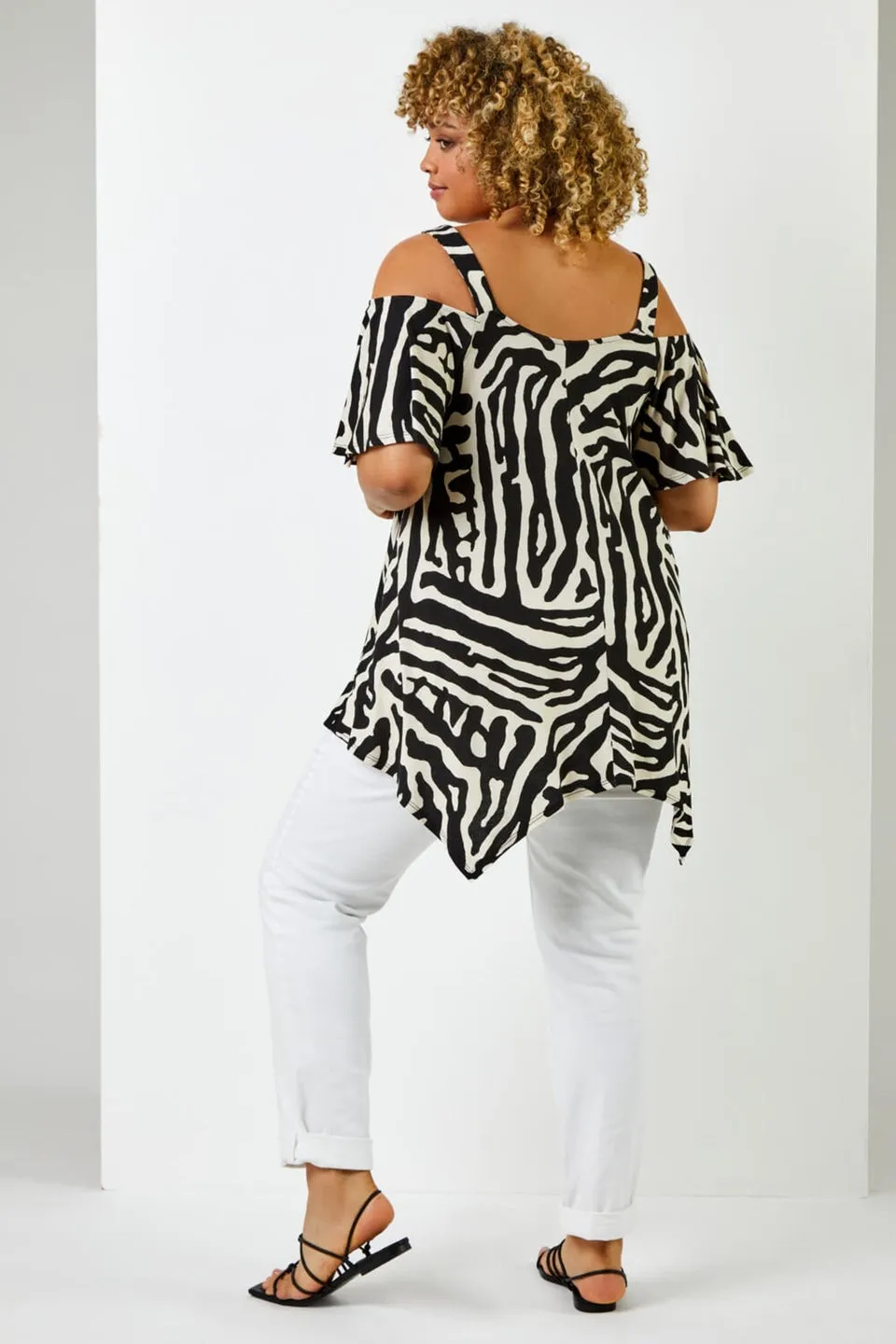 Roman Curve Black Abstract Animal Cold Shoulder Tunic Top