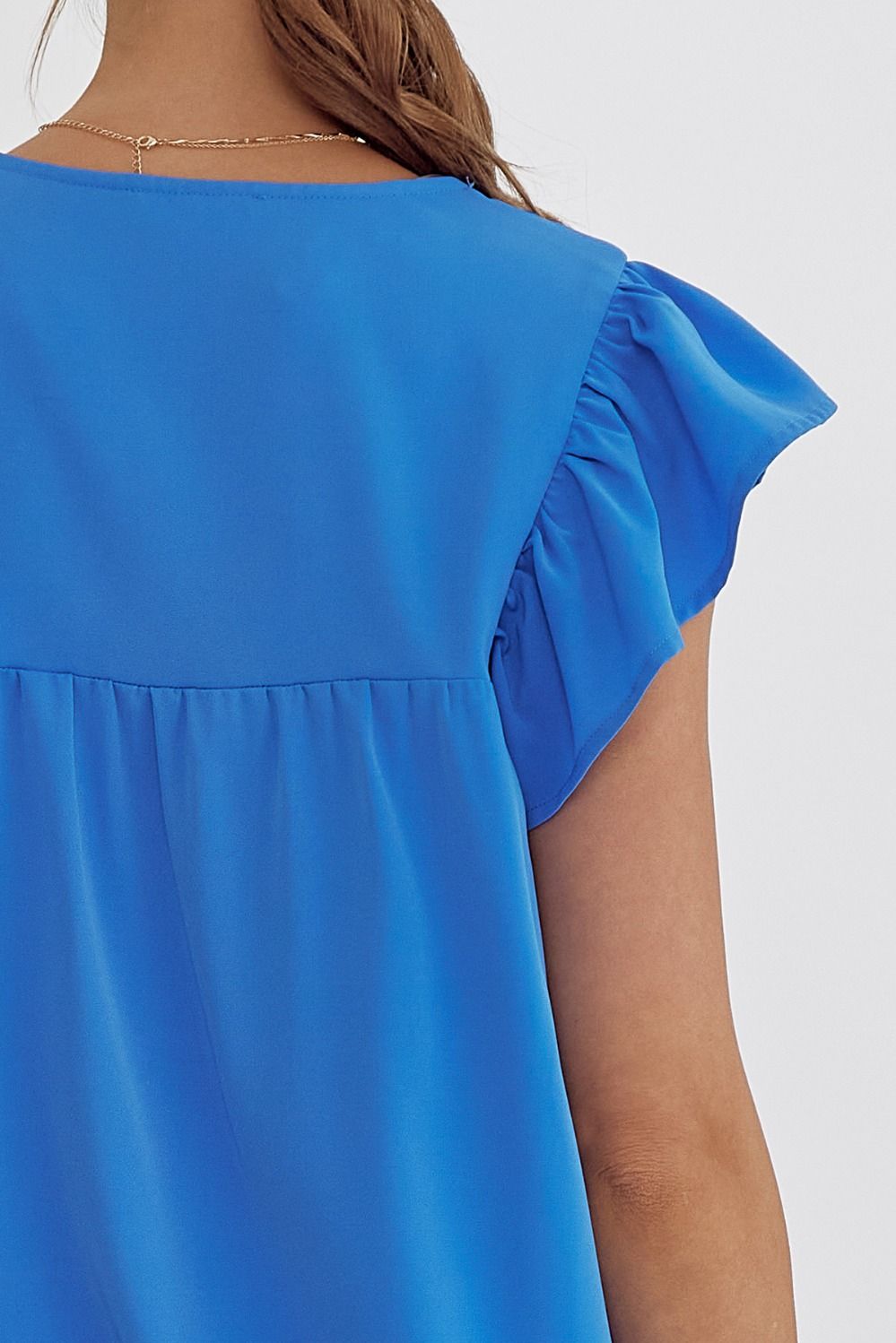 Solid V-Neck Sleeveless Ruffle Detail Top